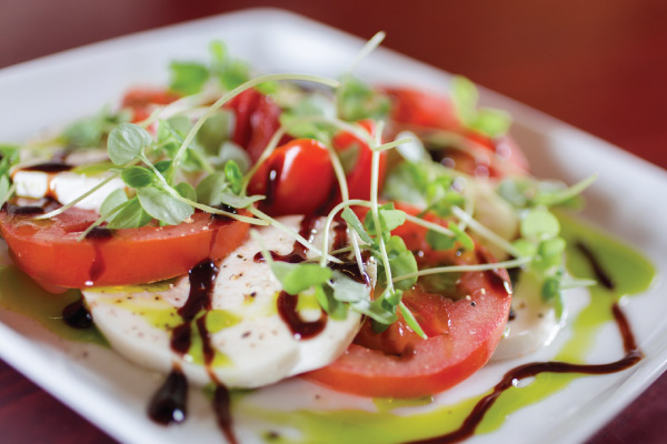 ArrowHead food - Caprese Salad tomato, cheese and dressing plate