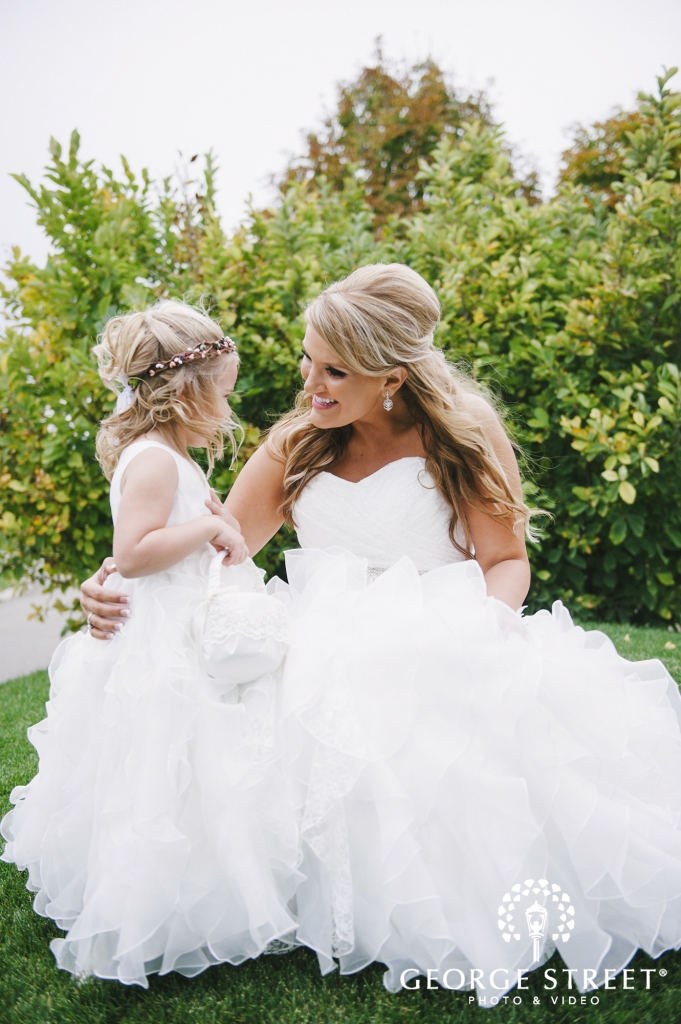 smiling bride with flower girl_681_1024