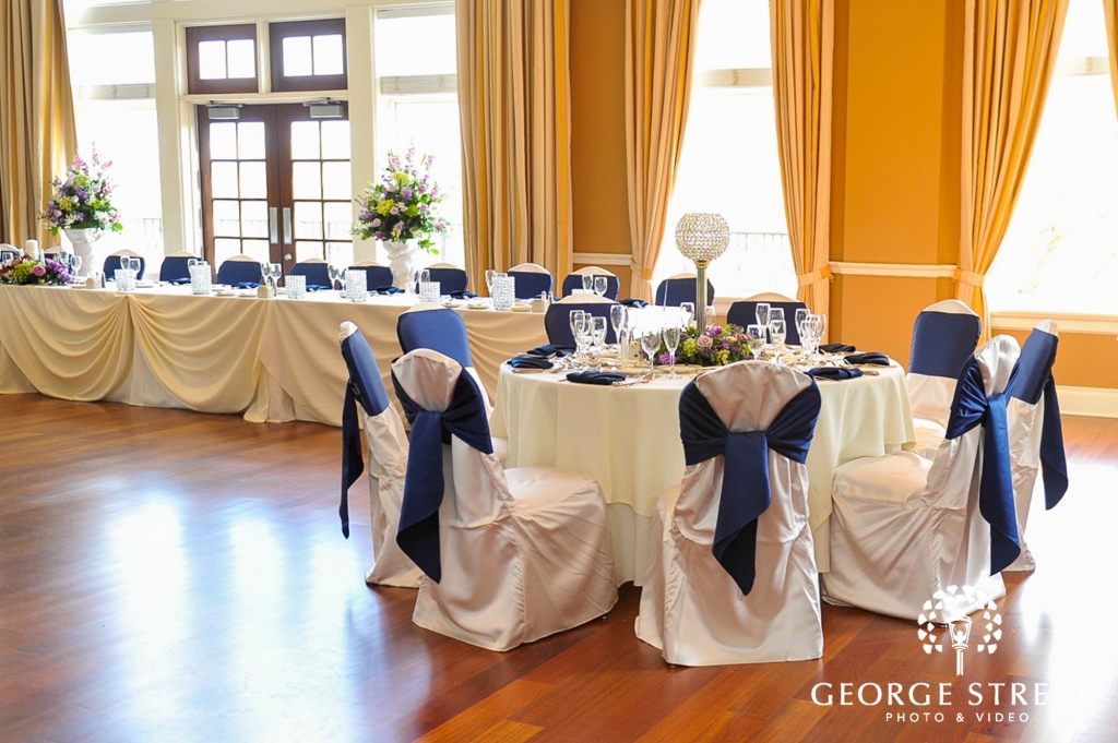 Arrowhead wedding - white and blue reception table and chair decor in gold room