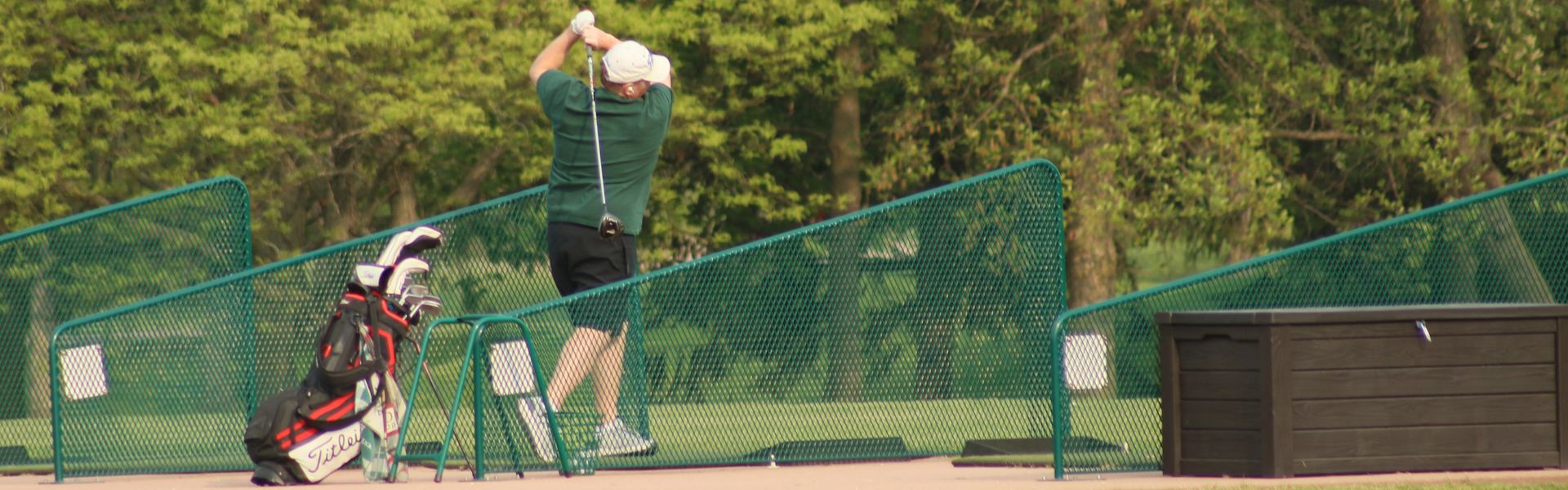 Golfer practicing his swing